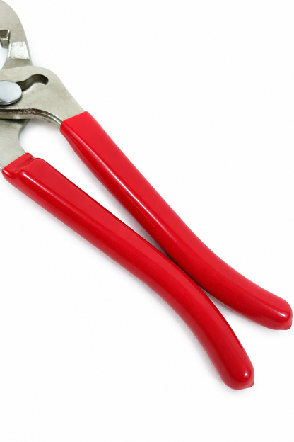 Détail des poignées rouges de la pince pour filtre à huile réglable de 60 à 90 mm
